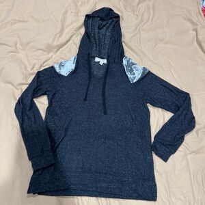 Black hoodie with touch of gray on shoulders